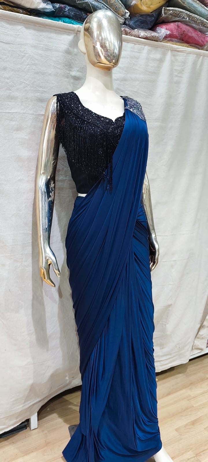 Designer Black blouse and blue one min saree
