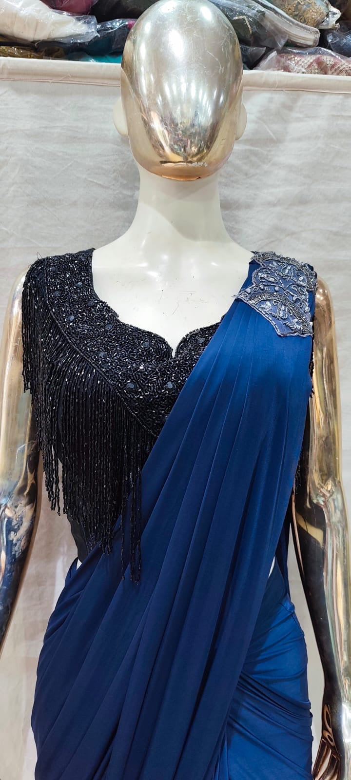Designer Black blouse and blue one min saree