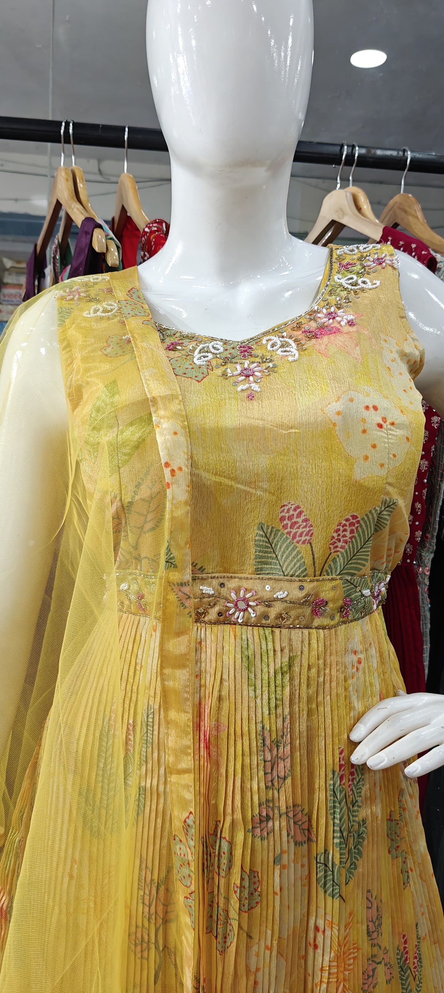 Yellow crush gown with embellished belt