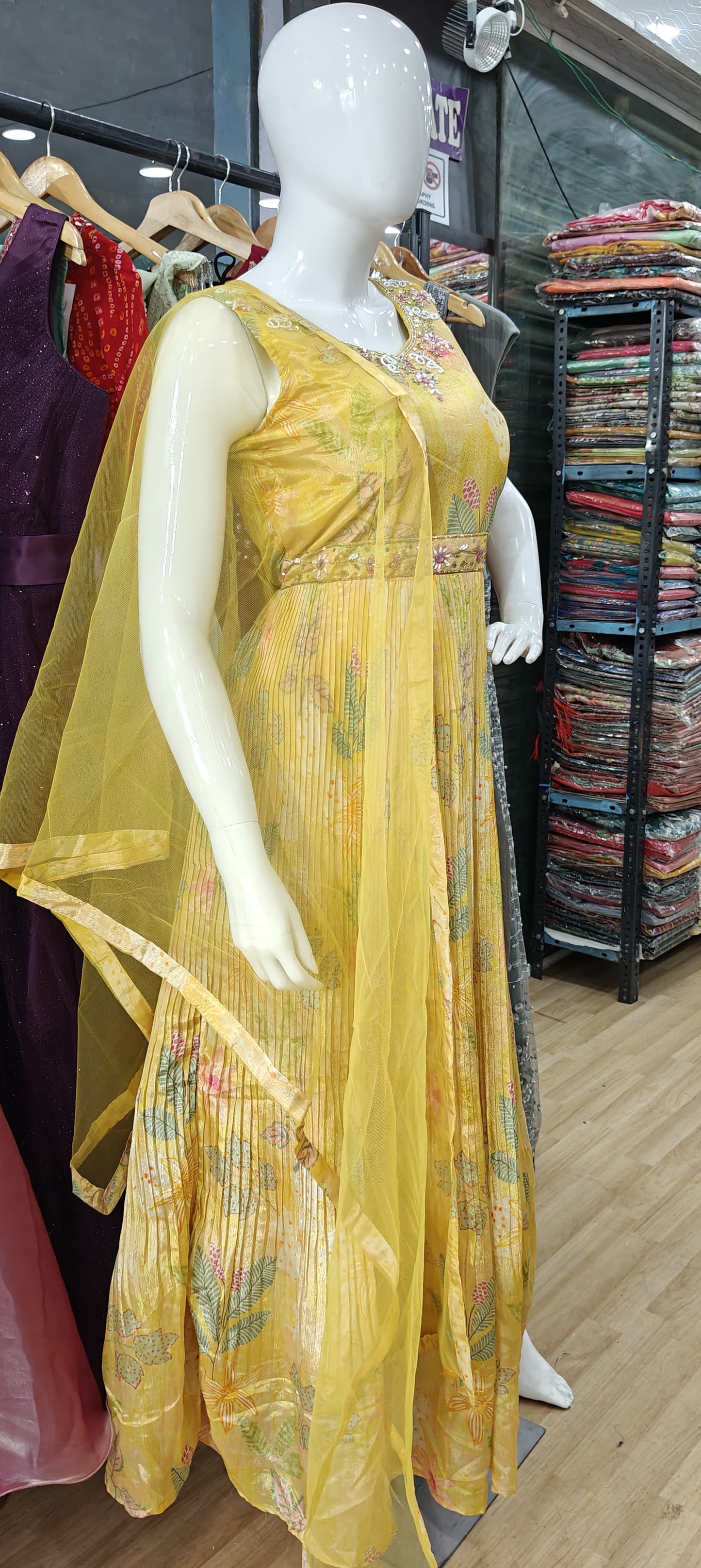 Yellow crush gown with embellished belt