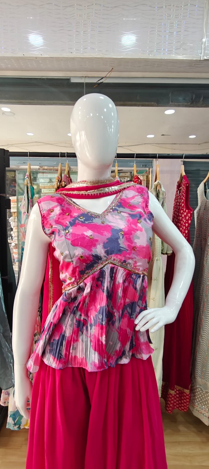 Pink abstract peplum set