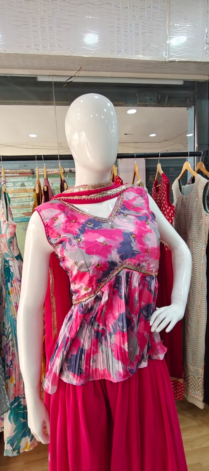 Pink abstract peplum set