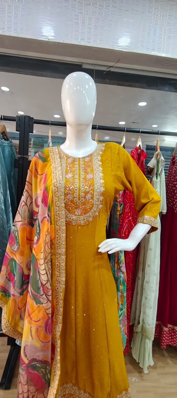 Yellow suit with beautiful printed dupatta