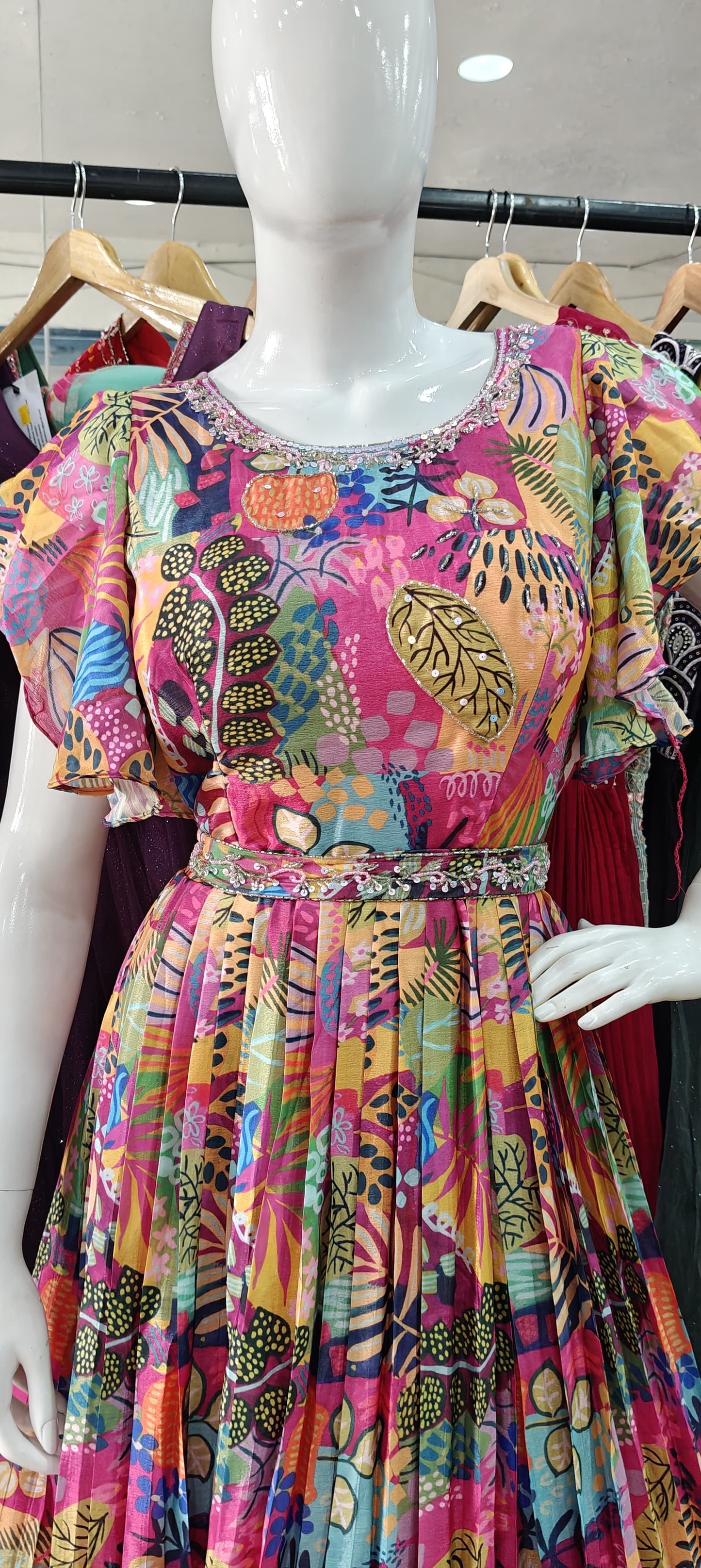 Printed gown with ruffle sleeves and belt