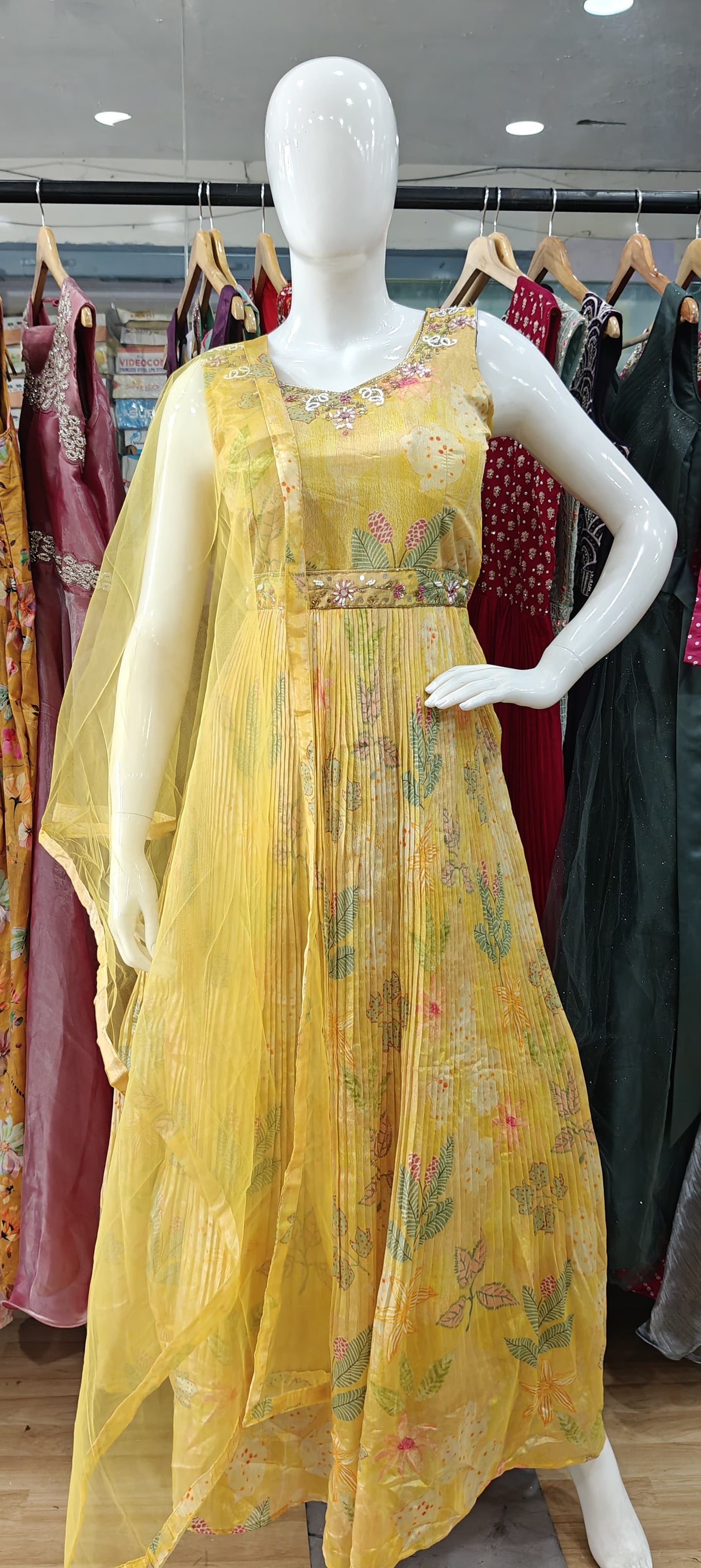 Yellow crush gown with embellished belt