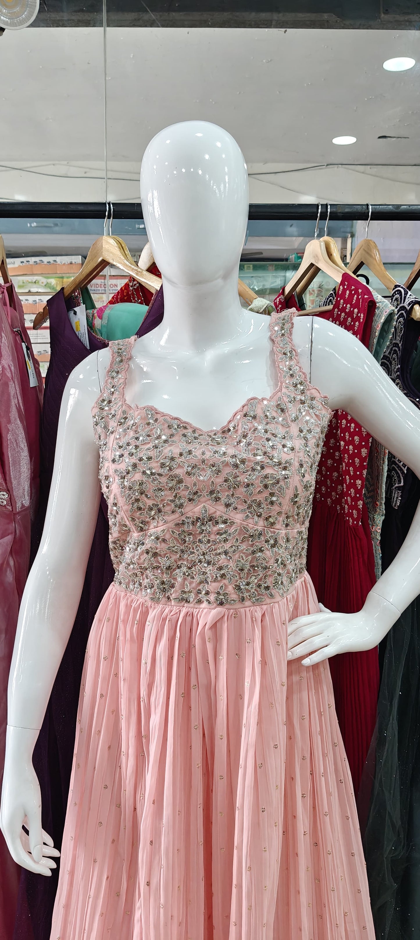 Peach georgette gown with embellished bodice