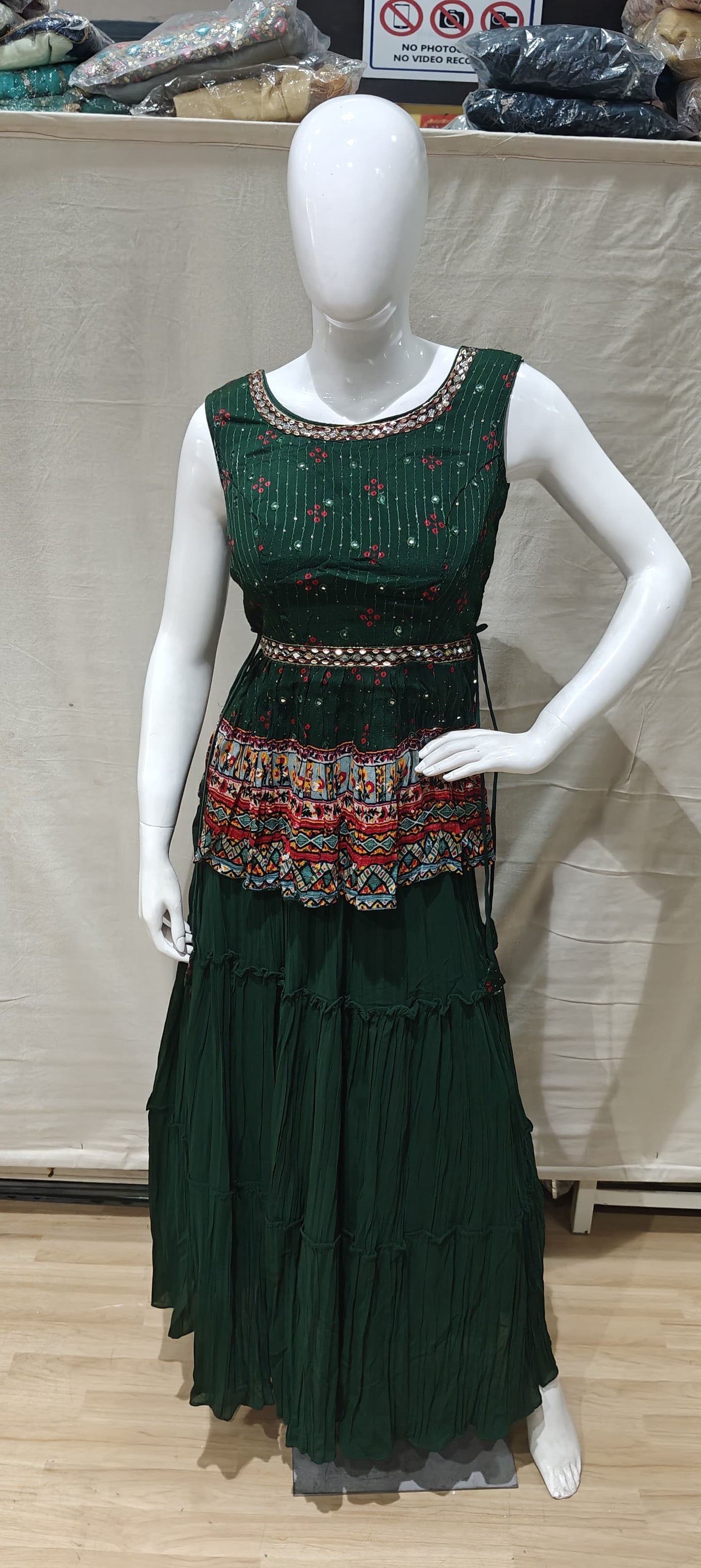 Traditional green peplum lehenga with belt