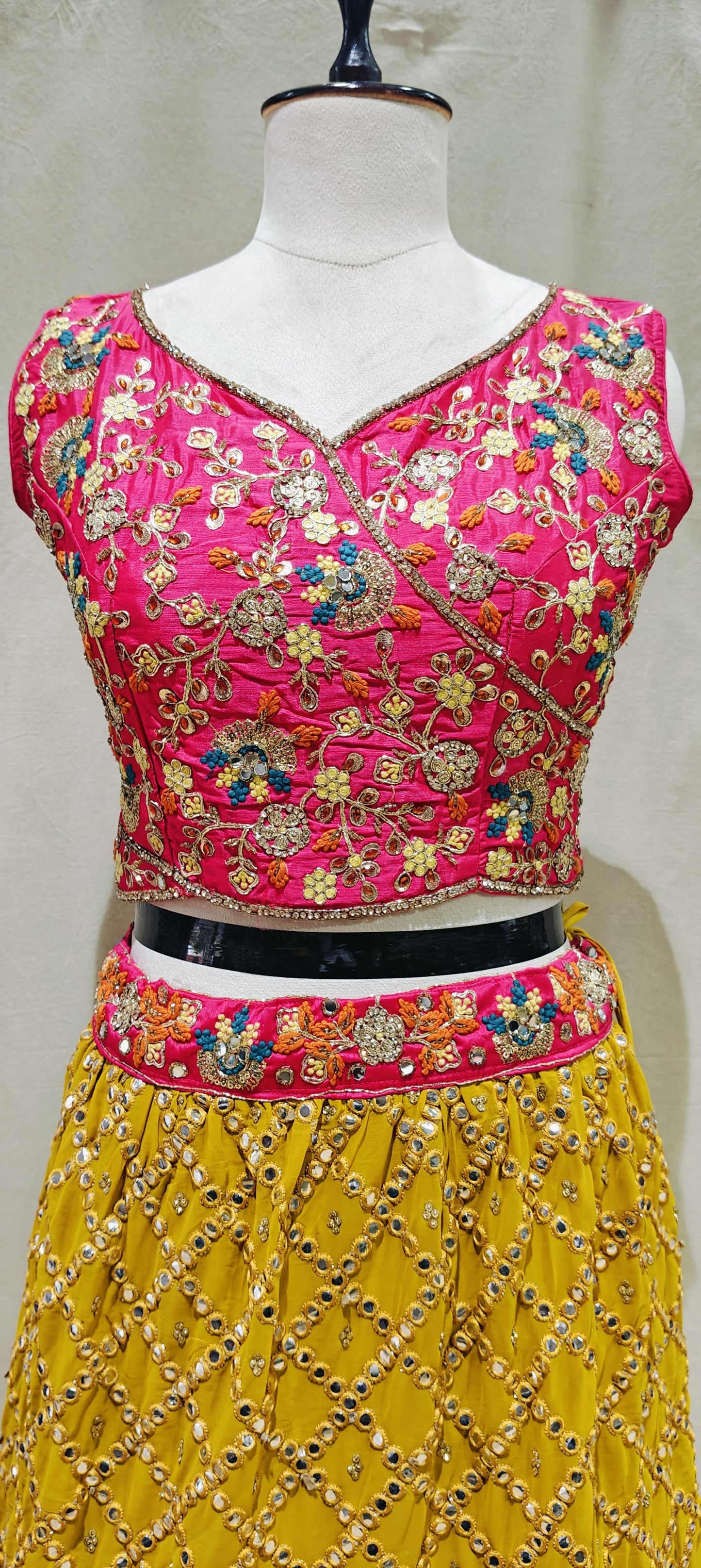 Pink blouse with yellow lehenga perfect ensemble