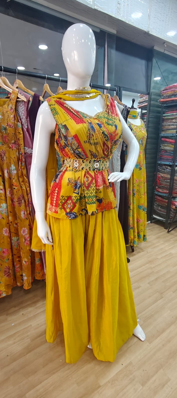 Designer yellow peplum set with belt