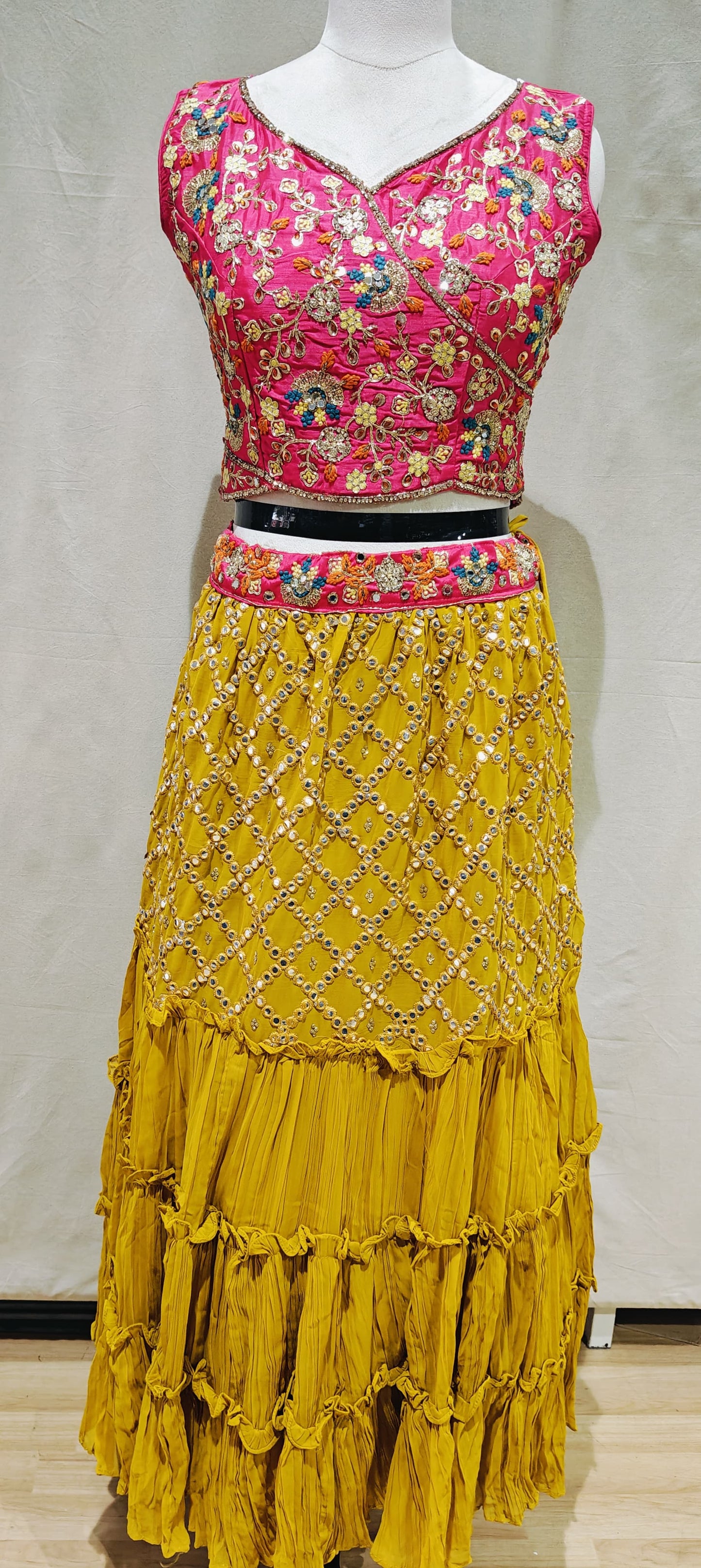 Pink blouse with yellow lehenga perfect ensemble