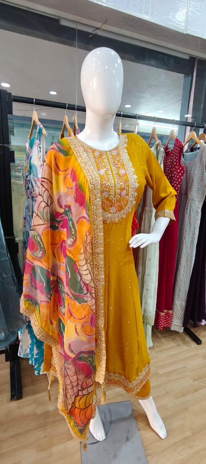 Yellow suit with beautiful printed dupatta