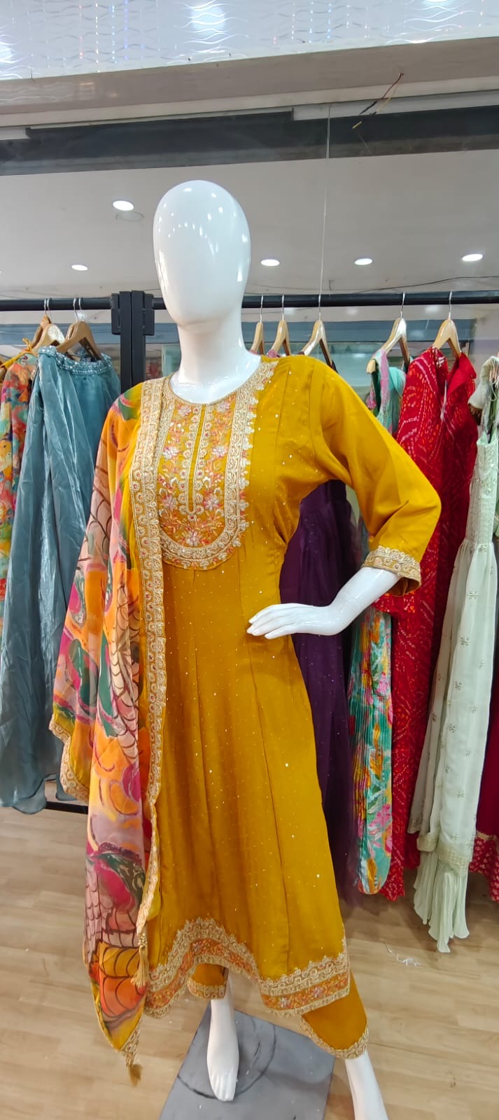Yellow suit with beautiful printed dupatta