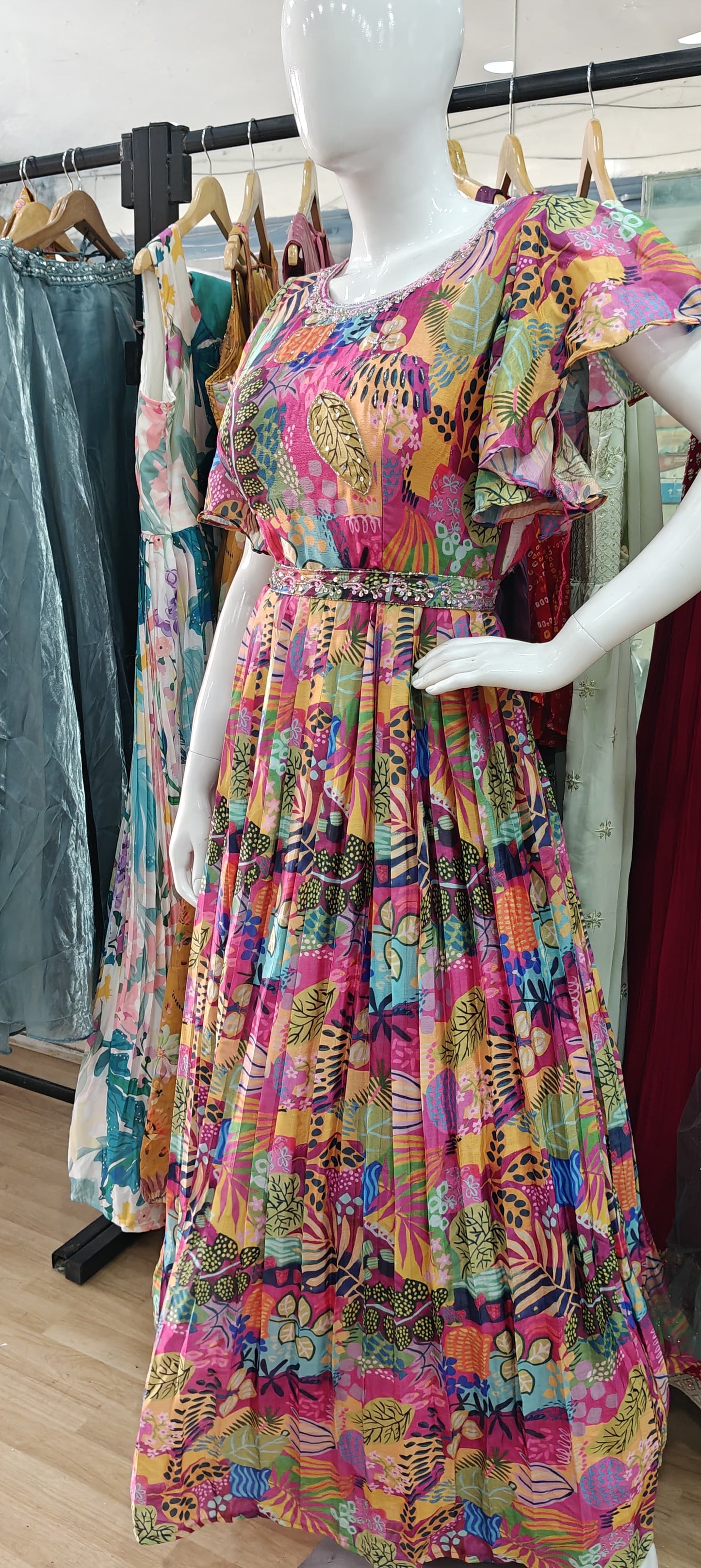 Printed gown with ruffle sleeves and belt