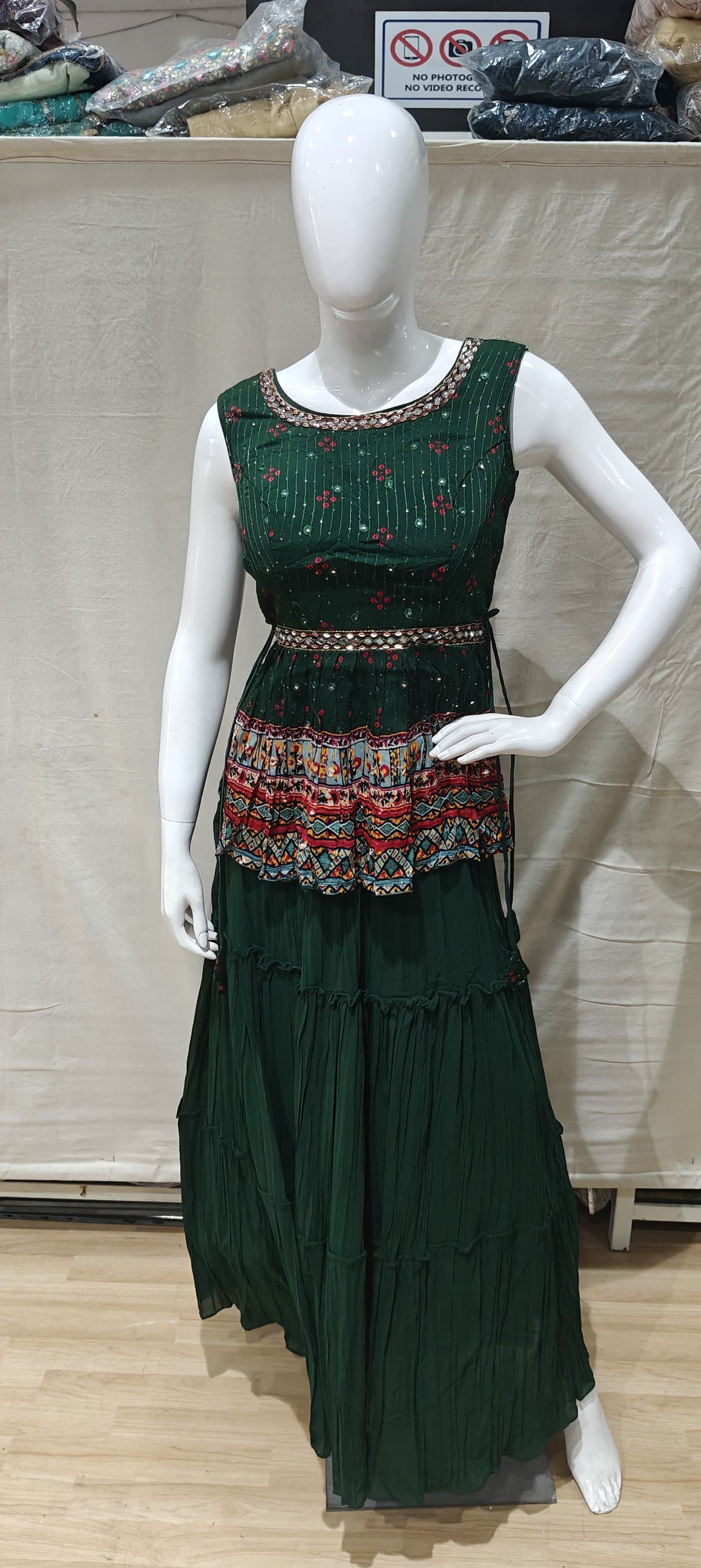 Traditional green peplum lehenga with belt