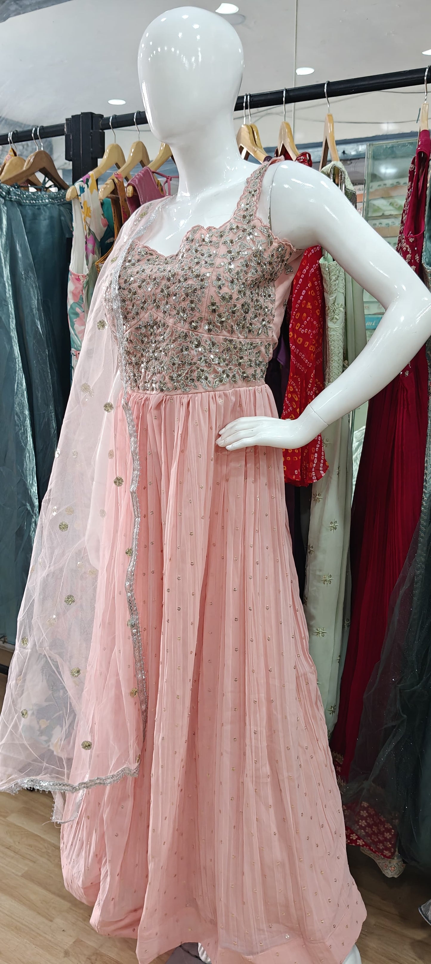 Peach georgette gown with embellished bodice