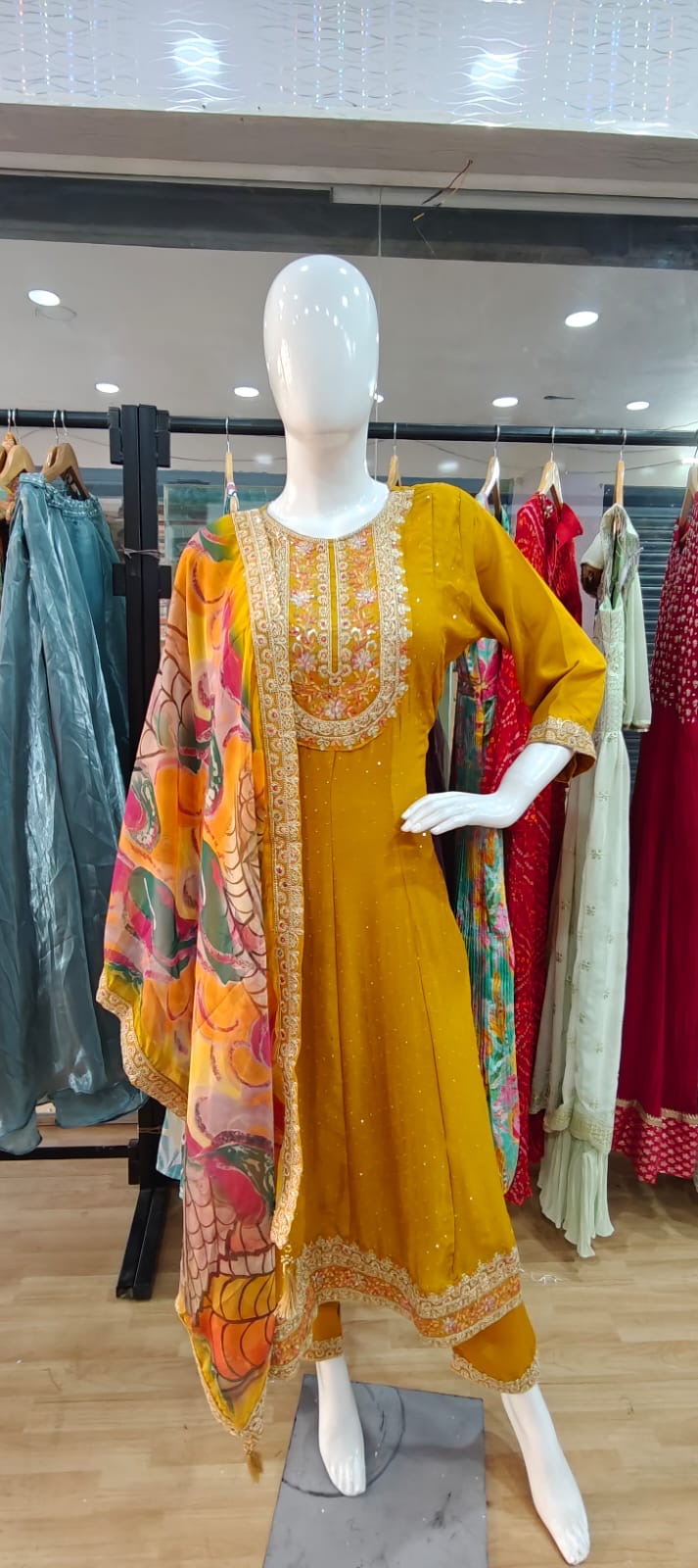Yellow suit with beautiful printed dupatta