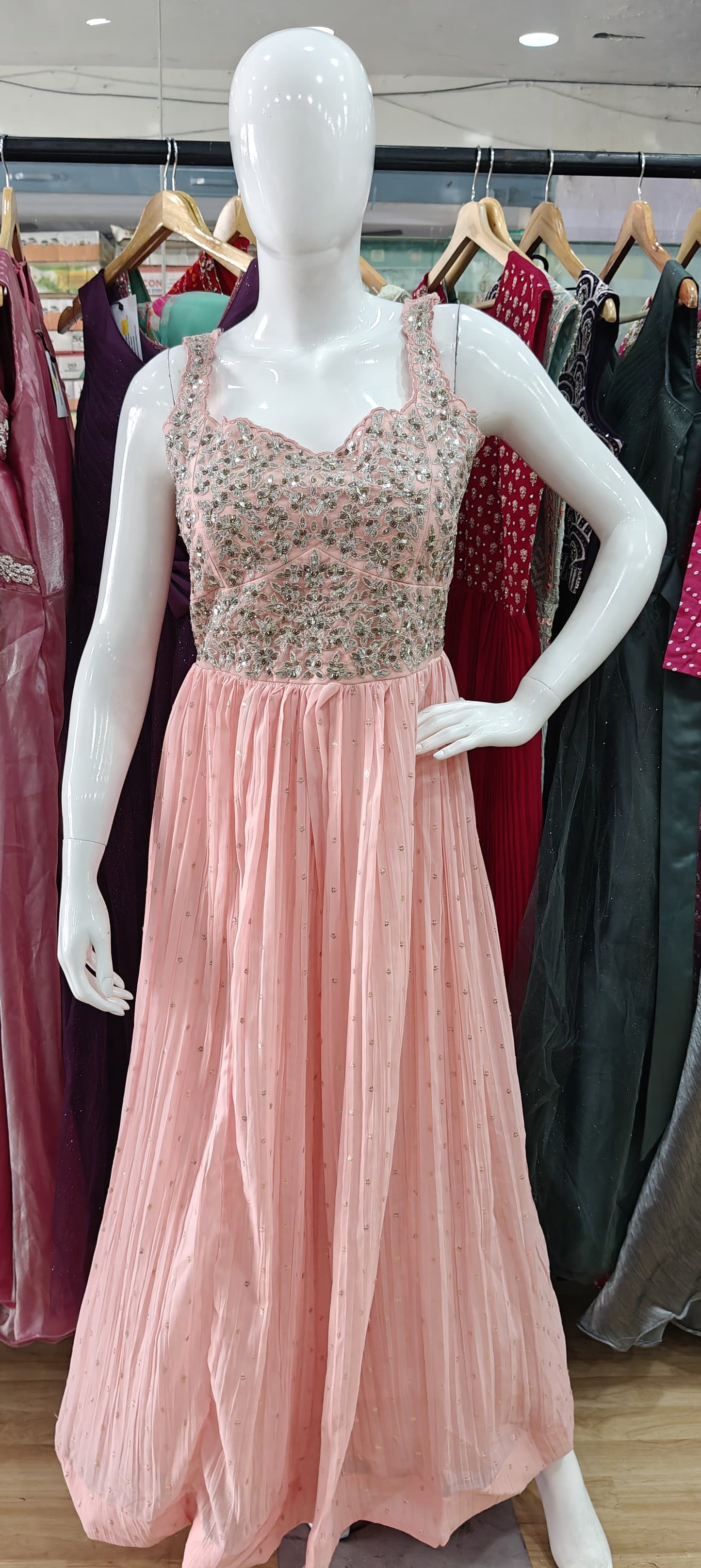 Peach georgette gown with embellished bodice