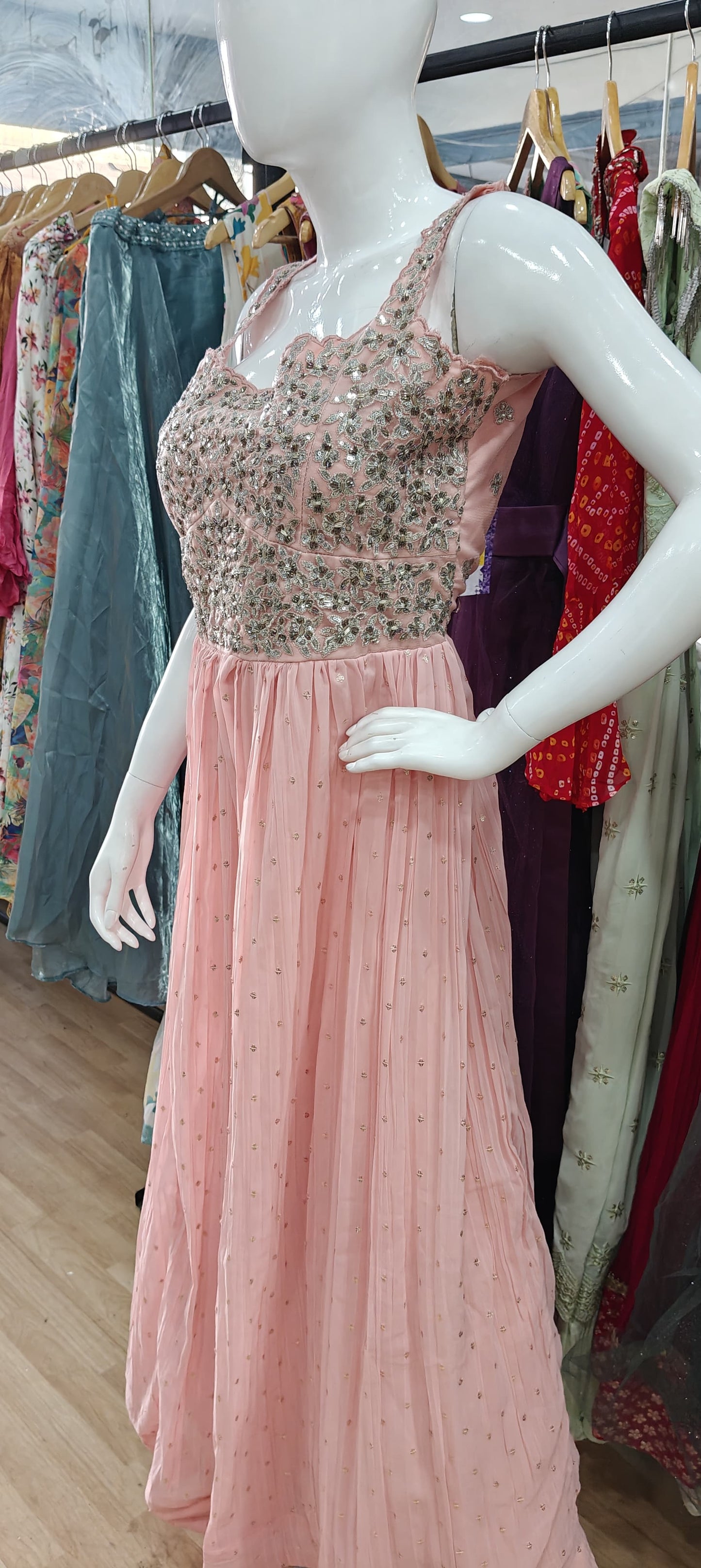 Peach georgette gown with embellished bodice
