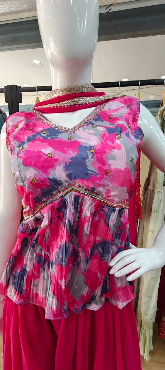 Pink abstract peplum set