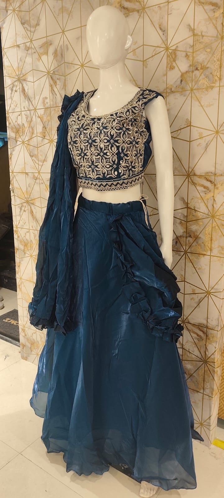 Tissue silk lehenga with attached drape
