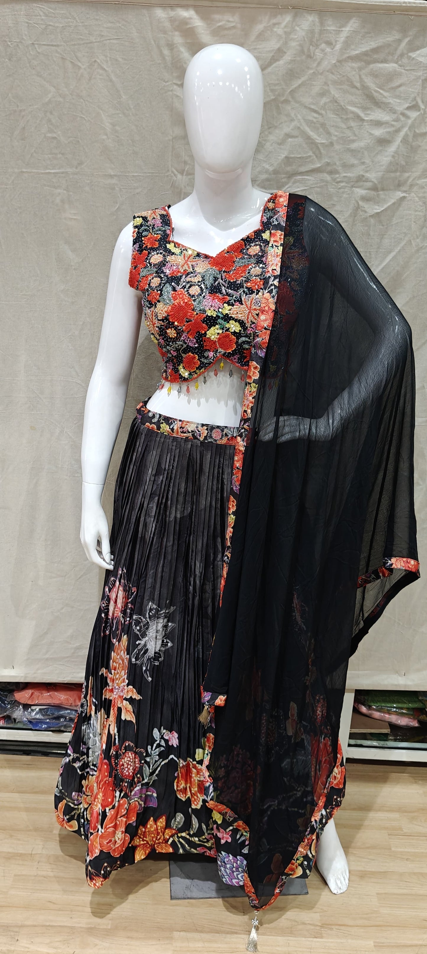 Black floral lehenga with floral blouse and dupatta
