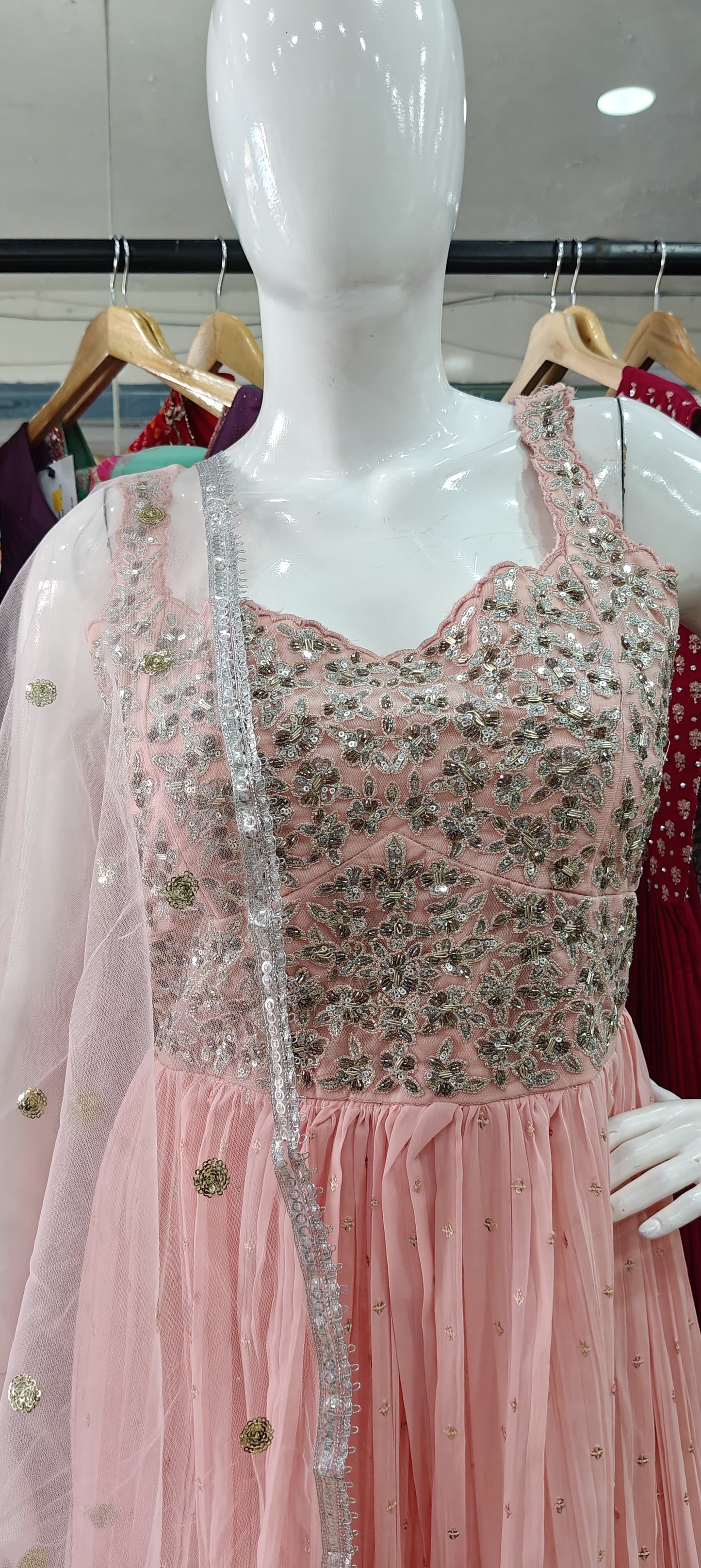 Peach georgette gown with embellished bodice