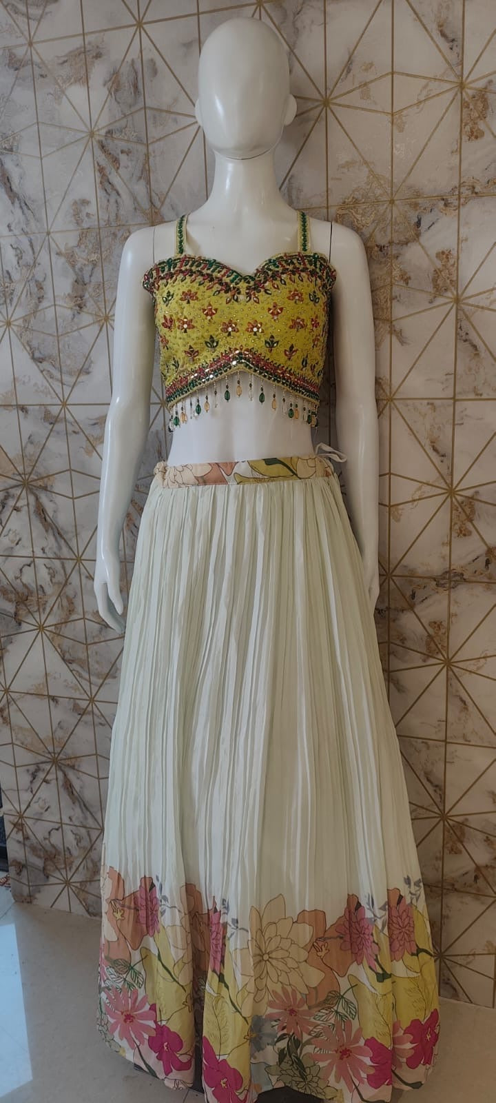 Floral cape yellow blouse lehenga