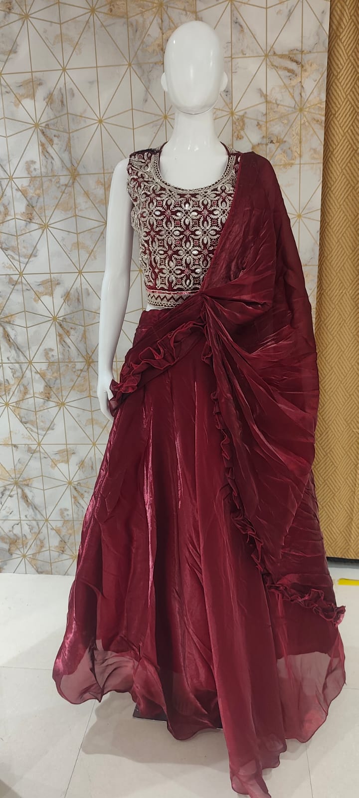 Tissue silk lehenga with attached drape