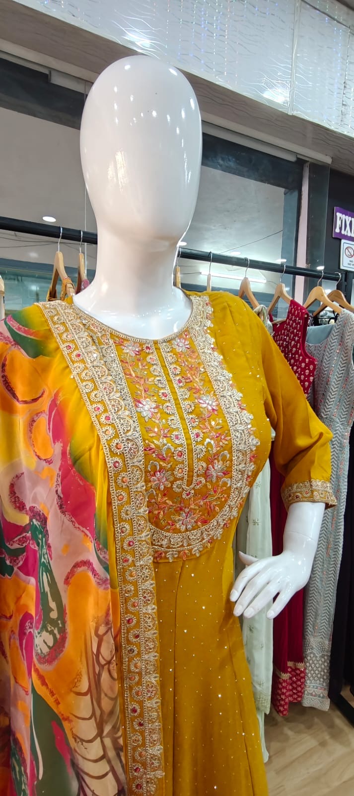 Yellow suit with beautiful printed dupatta