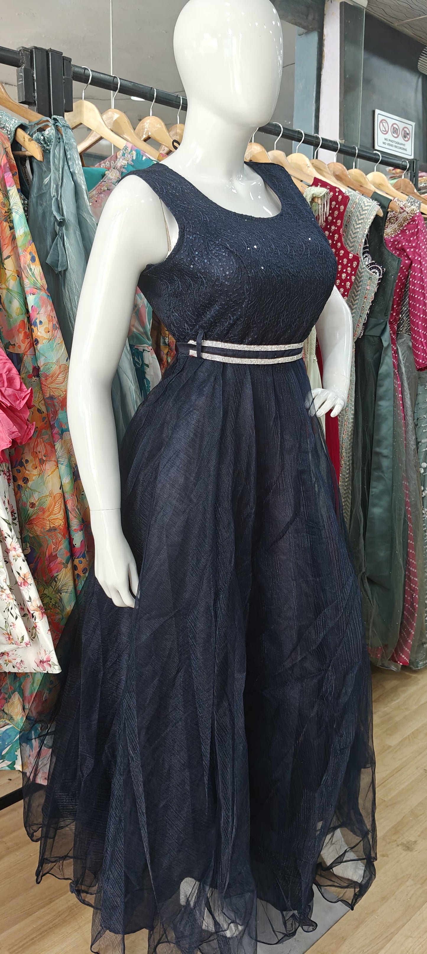 Blue sequins net gown with stone stunned belt