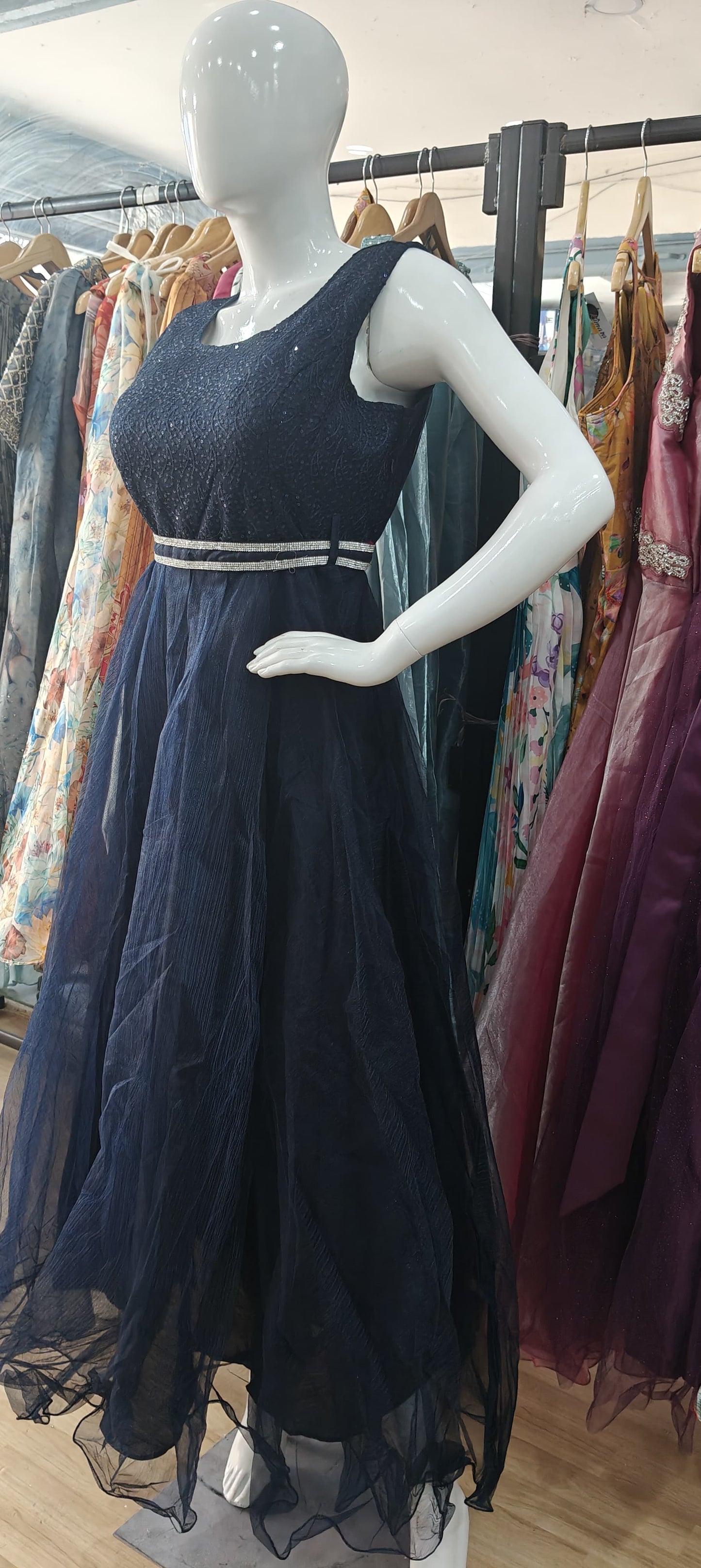 Blue sequins net gown with stone stunned belt