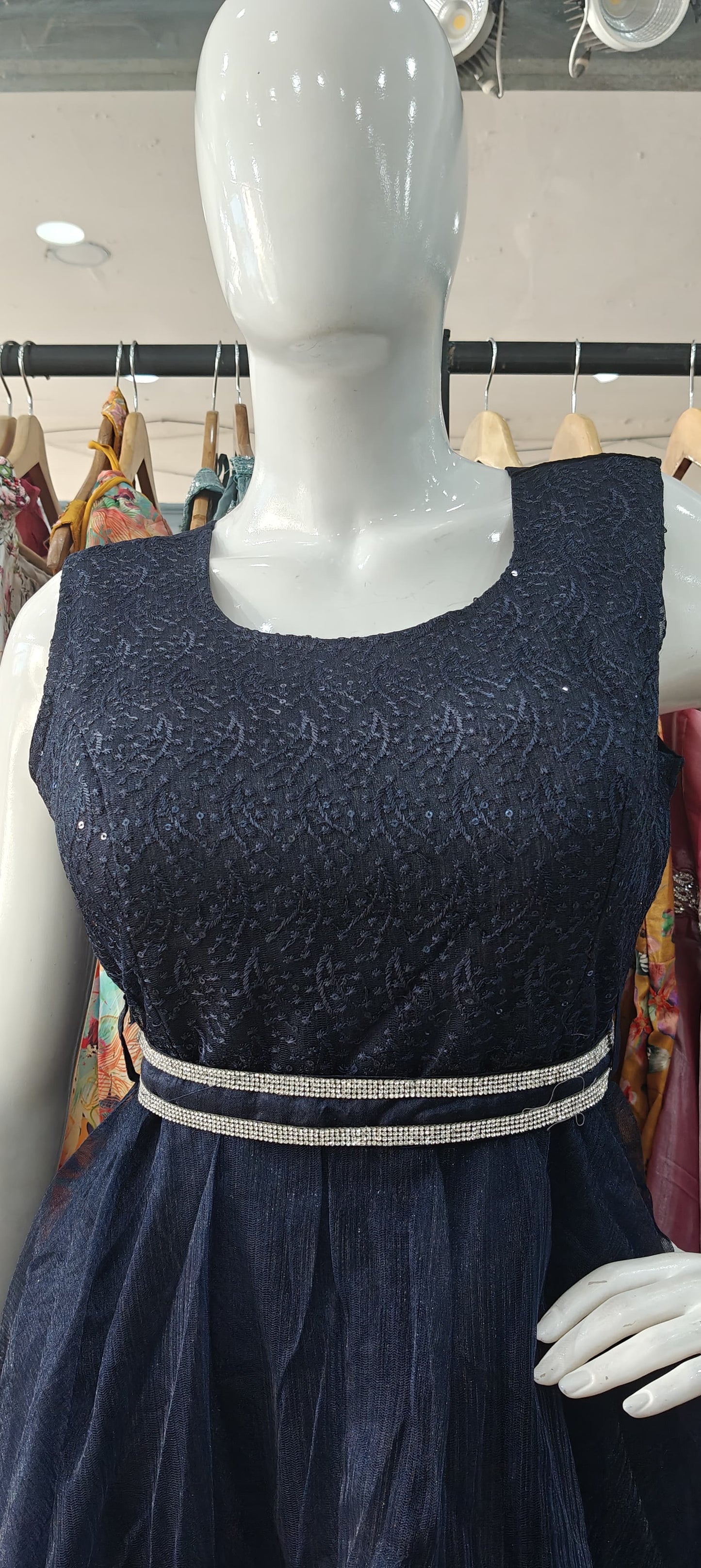Blue sequins net gown with stone stunned belt