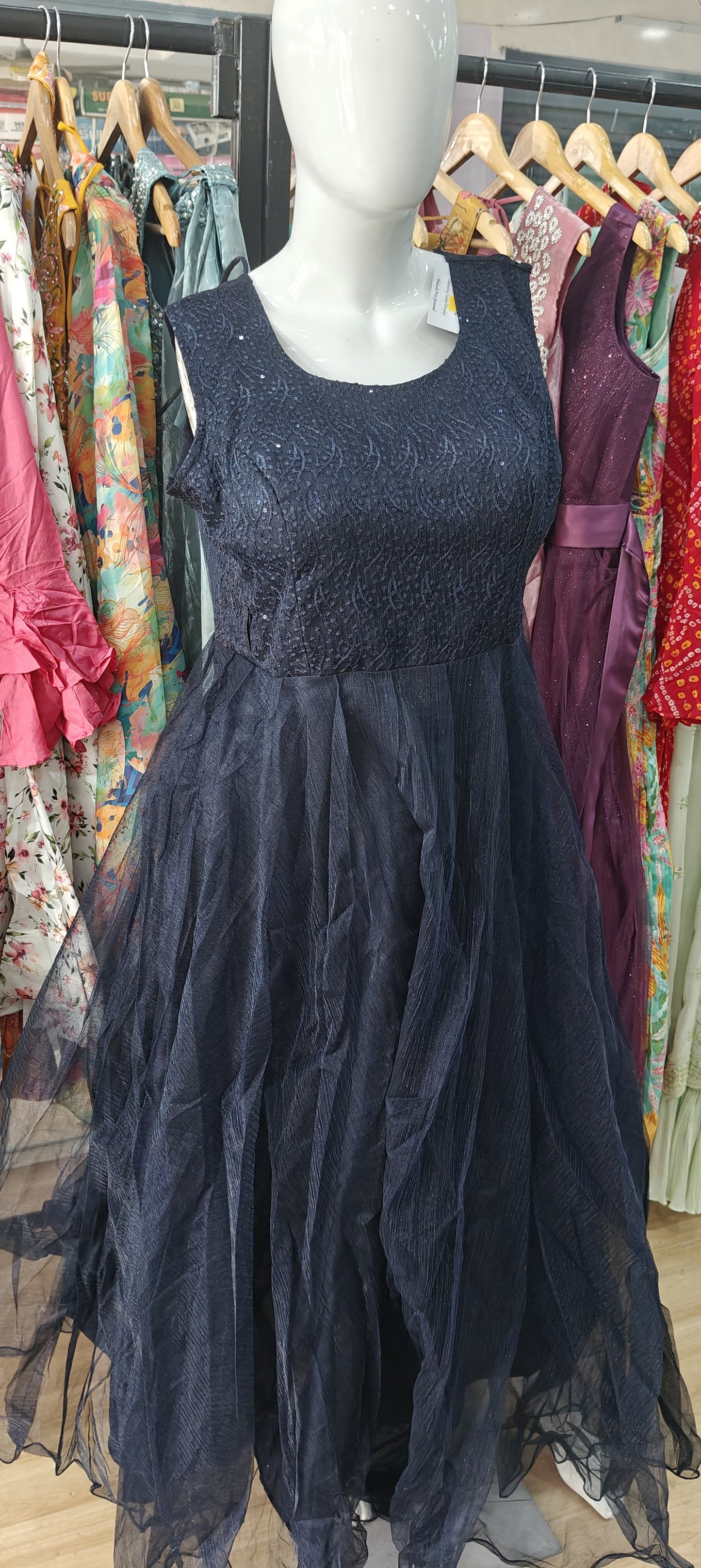 Blue sequins net gown with stone stunned belt